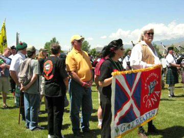 Steve Galbraith and Joyce Higginbotham Carrying the Galbraith Banner in the Parade